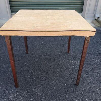 https://ctbids.com/#!/description/share/687773 Beautiful vintage wooden folding table with corduroy dust cover. 30x30x27