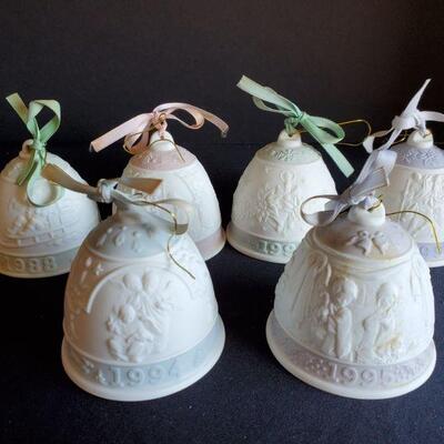 https://ctbids.com/#!/description/share/687835 Set of Lladro porcelain holiday bells from the years 1988, 1991, 1992, 1993, 1994 and...