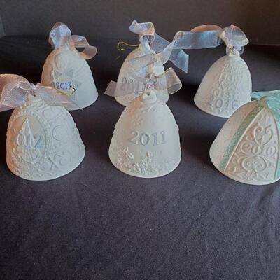 https://ctbids.com/#!/description/share/687841 Lladro porcelain Holiday bells from years 2010-2014 and 2016. 4