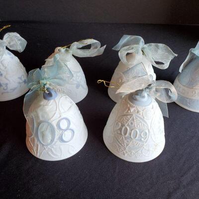 https://ctbids.com/#!/description/share/687839 Lladro porcelain annual Holiday bells from years 2004-2009. 4