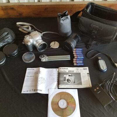 https://ctbids.com/#!/description/share/687778 Fujifilm FinePix 3800 digital camera with accessories. Includes extra lenses, carry bag...