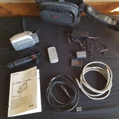 https://ctbids.com/#!/description/share/687772 Canon DVC Digital Camera ZR600. Includes cords, remote, carry bag and manual.  