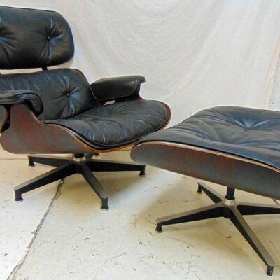 Eames Lounge Chair & Ottoman in Rosewood, black leather.