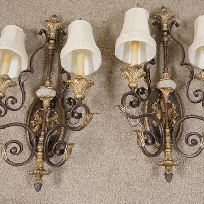 1013	PAIR OF IRON TWO LIGHT SCONCES 27 IN H 16 1/2 IN W 

