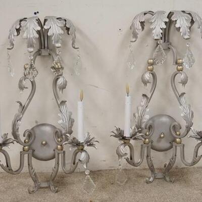 1015	PAIR OF IRON TWO LIGHT SCONCES W/ CUT CRYSTAL PRISMS PAINTED SILVER 28 IN H 17 1/2 IN W 
