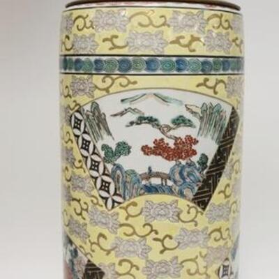 1008	LARGE ASIAN PROCELAIN CYLINDRICAL LAMP HAS SCENIC MEDALIONS & IS ON A CARVED WOODEN BASE. 29 IN H BASE IS 10 1/2 IN DIAMETER 
