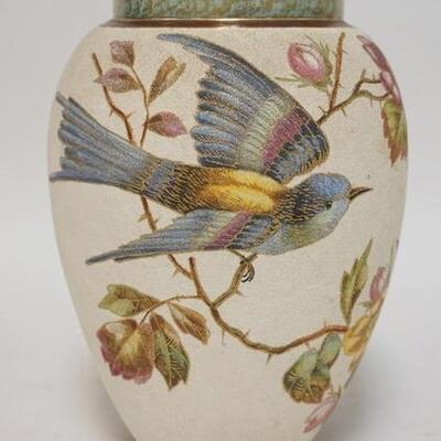 1004	VICTORIAN HAND PAINTED PORCELAIN VASE DECROATED W/ BIRD BUTTERFLY & FLOWERS. HAS A TEXTURED FINISH & HAS A FLAT FLAKE ON THE TOP...