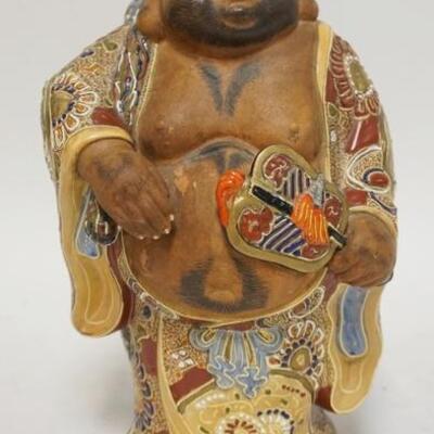 1007	HAND PAINTED ASIAN FIGURE OF A BEARDED MAN HOLDING A FAN. 11 IN H 

