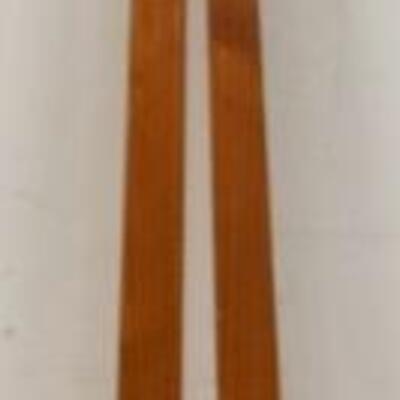1017	PAIR OF GIANT WOODEN CHOPSTICKS, THEY HAVE ASIAN WRITING IN RED. THEY ARE 66 IN L 

