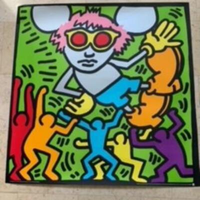 This is a Keith haring lithograph
Andy mouse 1986
With certificate of provenance 
Highly collectible 
Listings on eBay up to $3500
Mint...