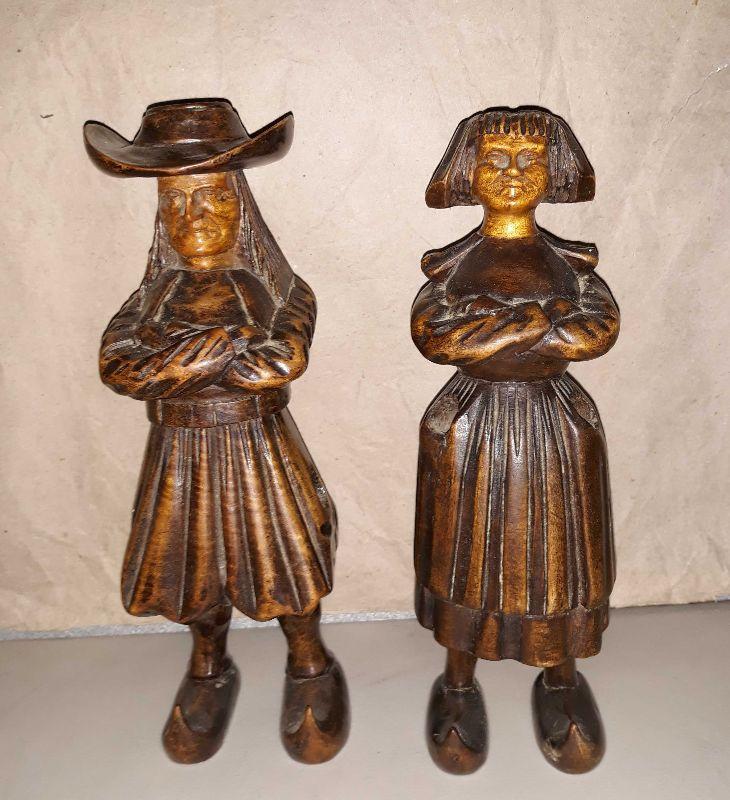 Pair of antique dutch wood carved figural match holder statues.