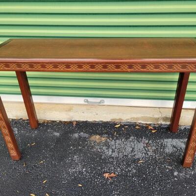 https://ctbids.com/#!/description/share/694345 This beautiful sofa table with cherry stained finish and decorative trim is 48