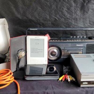https://ctbids.com/#!/description/share/694360 Nice assortment of electronics. Includes a Sony dual DVD/VHS player, 2 Amazon Kindles,...