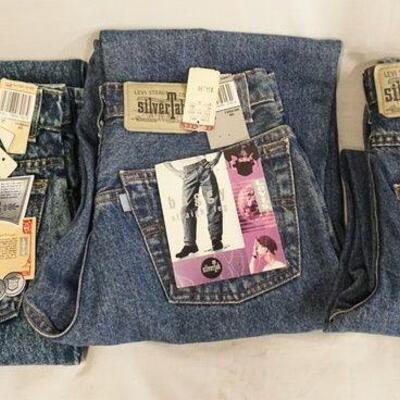 1123	LOT OF THREE PAIRS OF VINTAGE LEVI STRAUSS & COMPANY SILVER TAB JEANS W/ TAGS. SIZES ARE 11, 28 X 30 & 29 X 34 
