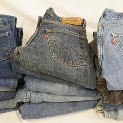 1150	LOT OF 18 PAIRS OF LEVI'S JEANS, FOUR HAVE ORANGE TABS. ALL ARE SIZE 12. VARYING DEGREES OF WEAR
