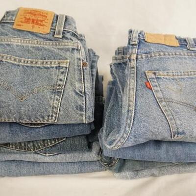 1011	LOT OF TEN PAIRS OF LEVI STRAUSS & COMPANY JEANS W/ RED TABS, VARYING DEGREE OF WEAR

