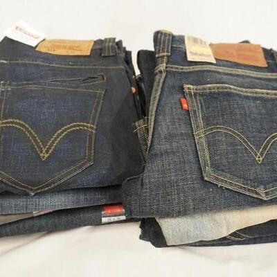 1114	LOT OF NINE PAIRS OF LEVI'S JEANS. NEW W/ TAGS. ALL HAVE 29 IN WAIST 
