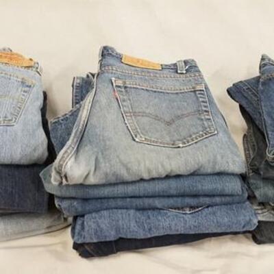1148	LOT OF 18 PAIRS OF LEVI JEANS W/ 32, 33, & 34 IN WAIST. VARYING DEGREES OF WEAR
