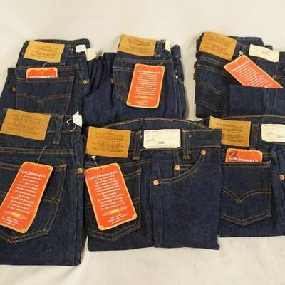 1058	LOT OF SIX PAIRS OF VINTAGE YOUTH SIZED LEVI STRAUSS & COMPANY JEANS W/ TAGS. 
