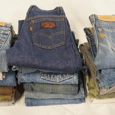 1167	LOT OF 18 PAIRS OF YOUTH SIZED LEVI'S JEANS (SIZES 8 THROUGH 10) INCLUDING EIGHT WHITE/ORANGE TAB. VARYING DEGREES OF WEAR 
