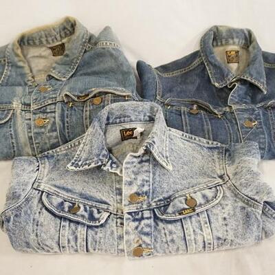 1093	LOT OF 3 VINTAGE USA MADE LEE DENIM JACKETS, SIZES 10, 44 & 38. VARYING DEGREES OF WEAR 
