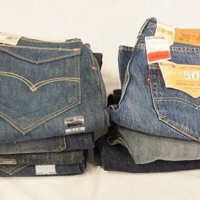 1134	LOT OF EIGHT PAIRS OF LEVI STRAUSS & COMPANY JEANS. NEW W/ TAGS. ALL HAVE 31 IN WAIST 

