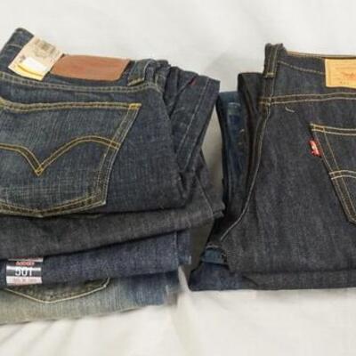 1116	LOT OF NINE PAIRS OF LEVI STRAUSS & COMPANY JEANS. NEW W/ TAGS. ALL HAVE 30 IN WAIST 
