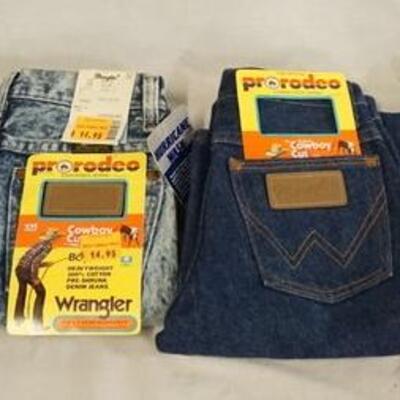 1039	LOT OF FOUR PAIRS OF VINTAGE BOYS WRANGLER *PRO RODEO* JEANS W/ ORIGINAL TAGS. TWO PAIRS ARE MARKED MADE IN USA. TWO ARE SIZE 11,...