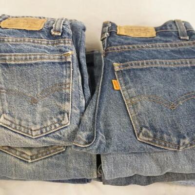 1004	LOT OF TEN PAIRS OF VINTAGE YOUTH SIZED LEVI STRAUSS & COMPANY JEANS W/ ORANGE TABS, VARYING DEGREE OF WEAR
