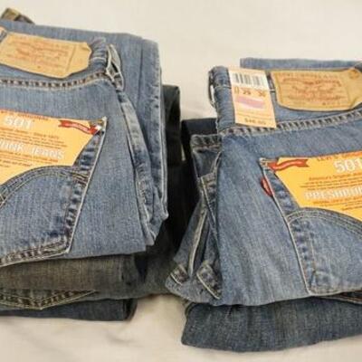 1137	LOT OF NINE PAIRS OF LEVIS JEANS. NEW W/ TAGS. ALL HAVE 29 IN W 

