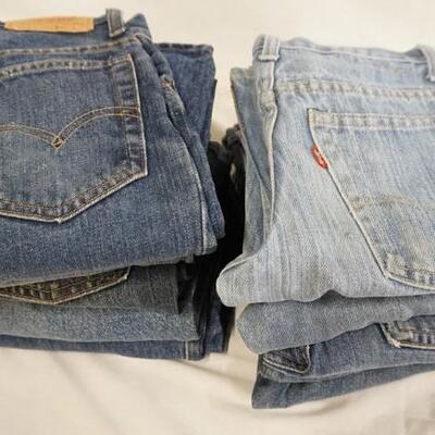 1009	LOT OF TEN YOUTH SIZED VINTAGE LEVI STRAUSS & COMPANY JEANS W/ RED TABS, VARYING DEGREE OF WEAR
