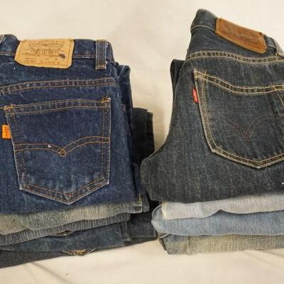 1016	LOT OF 10 PAIRS OF LEVI STRAUSS & COMPANY JEANS W/ RED & ORANGE TABS, VARYING DEGREE OF WEAR
