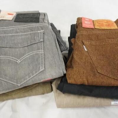 1115	LOT OF NINE PAIRS OF LEVI STRAUSS & COMPANY JEANS. NEW W/ TAGS. ALL HAVE 29 IN WAIST 

