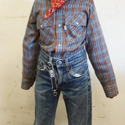 1192	YOUNG BOY MANNEQUIN CLOTHED WITH VINTAGE SELVEDGE LEVI JEANS, VINTAGE LEVI SHIRT WITH WHITE TAB, BANDANNA, WESTERN BOOTS AND STETSON...