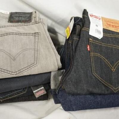 1149	LOT OF NINE PAIRS OF LEVI'S JEANS. NEW W/ TAGS. ALL HAVE 28 IN WAIST
