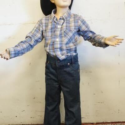 1183	YOUNG MALE MANNEQUIN WITH VINTAGE ORANGE TAB LEVIS, VINTAGE PREPSHIRT AND BLACK HAT. MANNEQUIN IS MISSING FFINGERS AND IS...