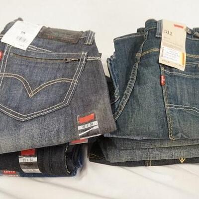 1131	LOT OF NINE PAIRS OF LEVI STRAUSS & COMPANY JEANS, INCLUDING ONE PAIR OF USA MADE VINTAGE SILVER TAB. ALL HAVE 29 IN WAIST
