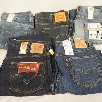 1212	LOT OF FIVE PAIRS OF LEVIS JEANS. NEW W/ TAGS. W/ 36, 38 & 40 IN WAIST SIZES 
