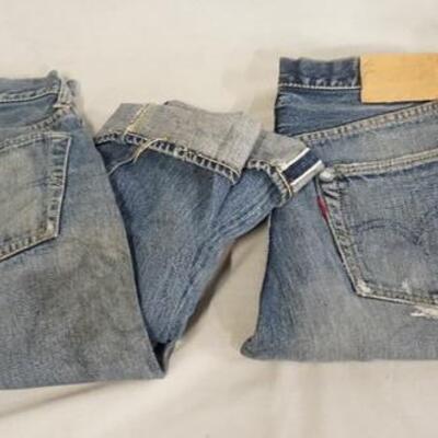1095	TWO PAIRS OF VINTAGE LEVI STRAUSS & COMPANY SELVEDGE JEANS W/ BIG E. VARYING DEGREES OF WEAR 
