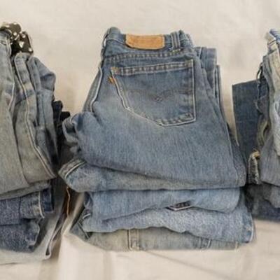 1023	LOT OF 15 PAIRS OF LEVI STRAUSS & COMPANY JEANS, VARYING DEGREE OF WEAR
