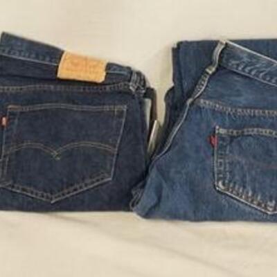 1046	LOT OF FOUR PAIRS OF MENS SIZED LEVI STRAUSS & COMPANY JEANS. THREE ARE SELVEDGE, VARYING DEGREE OF WEAR
