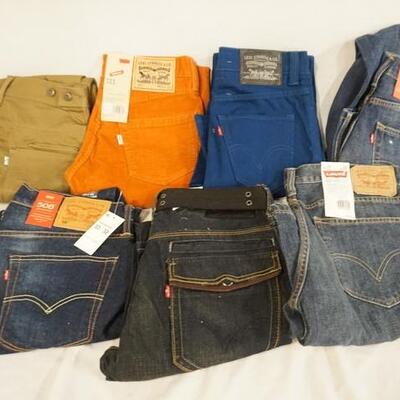 1213	LOT OF SEVEN PAIRS OF LEVI'S JEANS W/ 28,29, 30, 32 & 33 IN WAIST SIZES. NEW W/ TAGS 
