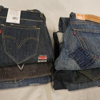 1104	LOT OF NINE PAIRS OF LEVI STRAUSS & COMPANY JEANS. NEW W/ TAGS. ALL HAVE 29 IN WAIST 
