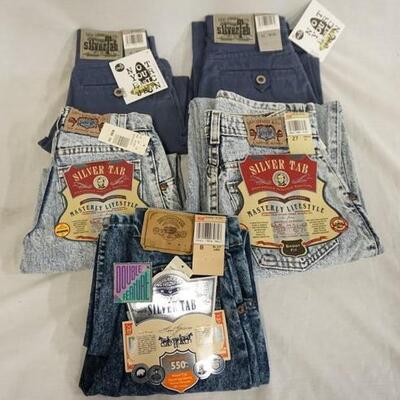 1014	LOT OF FIVE PAIRS OF YOUTH SIZED LEVI STRAUSS & COMPANY SILVER TAB JEANS. NEW W/ TAGS 
