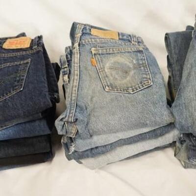 1156	LOT OF 18 PAIRS OF LEVI'S JEANS, INCLUDING NINE W/ ORANGE TABS. ALL ARE SIZE 14. VARYING DEGREES OF WEAR 
