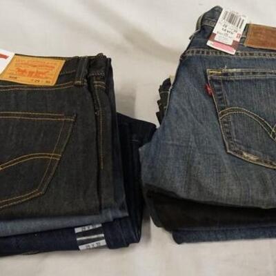 1126	LOT OF NINE PAIRS OF LEVI STRAUSS & COMPANY JEANS.  NEW W/ TAGS ALL HAVE 29 IN WAIST 
