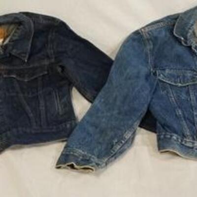 1076	LOT OF TWO LEVI STRAUSS & COMPANY DEMIN JACKETS ONE IS SIZE 38 MARKED MADE IN USA THE OTHER IS SIZE 18 MARKED MADE IN CANADA
