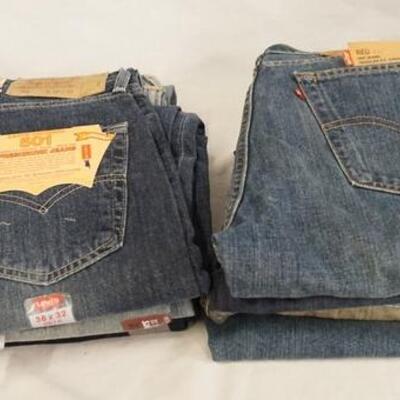 1102	LOT OF NINE PAIRS OF LEVI'S JEANS, NEW W/ TAGS. ALL HAVE 38 IN WAIST
