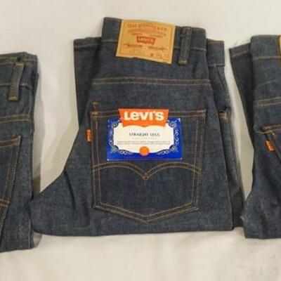 1074	LOT OF THREE PAIRS OF VINTAGE LEVI STRAUSS & COMPANY 519 JEANS W/ ORANGE TABS. STILL HAVE ORIGINAL TAGS. SIZES ARE W 28 X L 31, W 28...