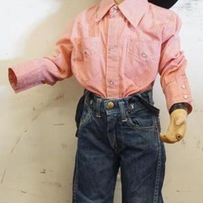 1191	YOUNG BOY MANNEQUIN CLOTHED WITH LEE JEANS , JEAN SUSPENDERS, VINTAGE TRUE WEST ROCKMOUNT RANCH WEAR SHIRT AND COWBOY HAT WITH...